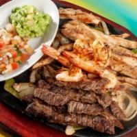 #51 Parrillada Para 4 · Beef Fajita, Chicken Fajita, Shrimp, Short Ribs, Sausage for 4 people. Served with Mexican r...