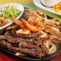 #49 Parri Mix Con Camaron Para 1 · Mix Fajitas (Beef Fajita & Chicken Fajita) with Shrimp for 1 person. Served with Mexican ric...