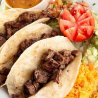 #11 Tacos Al Carbon Chicken Fajita (3) · Served with rice, charro beans, pico de gallo & guacamole.