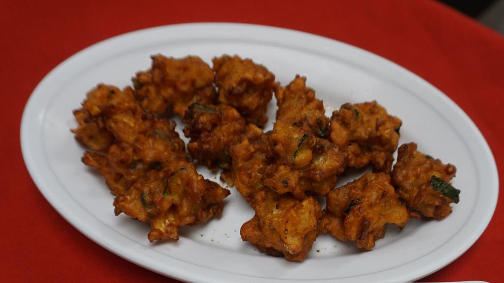 Chicken Pakora(G) · Chicken breast pieces battered in gram flour with spices & deeply fried.