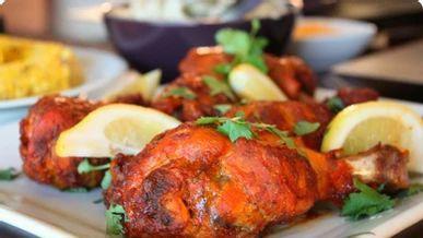 Tandoori Chicken(G) · Chicken leg marinated with yogurt & Indian spices then roasted in clay oven.