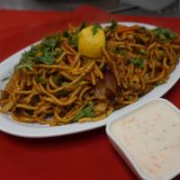 Chicken Chow-Min · Noodled, fresh vegetables and chicken cooked with our mild spices