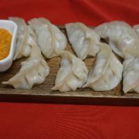Vegetable Momo Steam/ Fried · Vegan.  (steamed/fried)..10.99(vegan) fresh vegetable mixed with minced onions, cilantro. ga...
