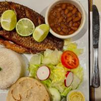 Mojarra Frita · Whole fried fish. Served with rice, beans and salad.