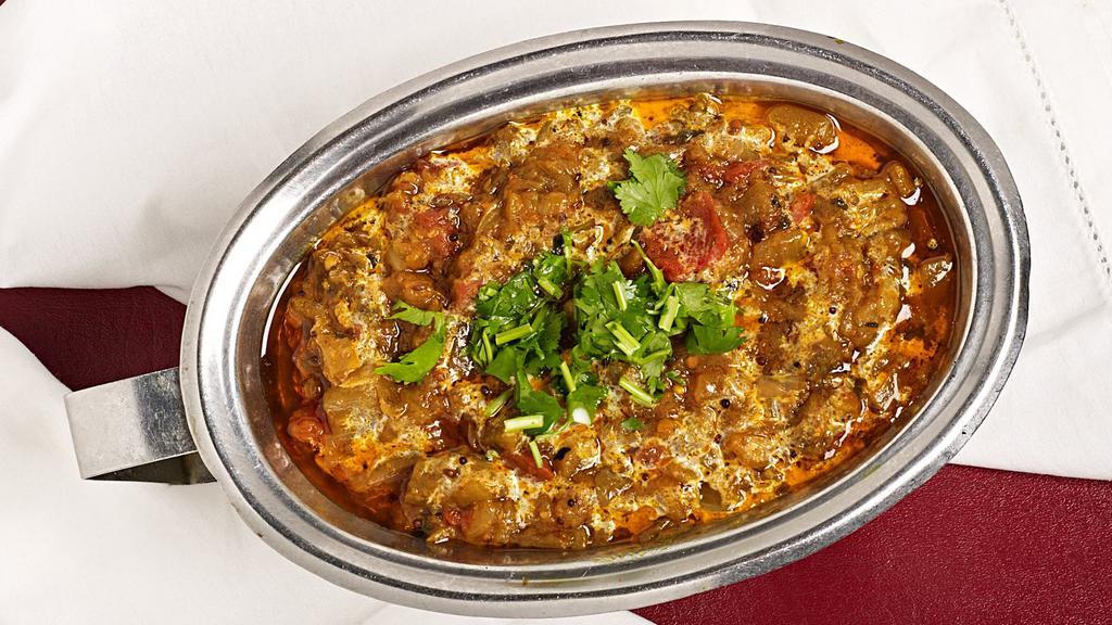 Baingan Bharta · Eggplant roasted, mashed and sauteed with tomatoes, onions and spices.