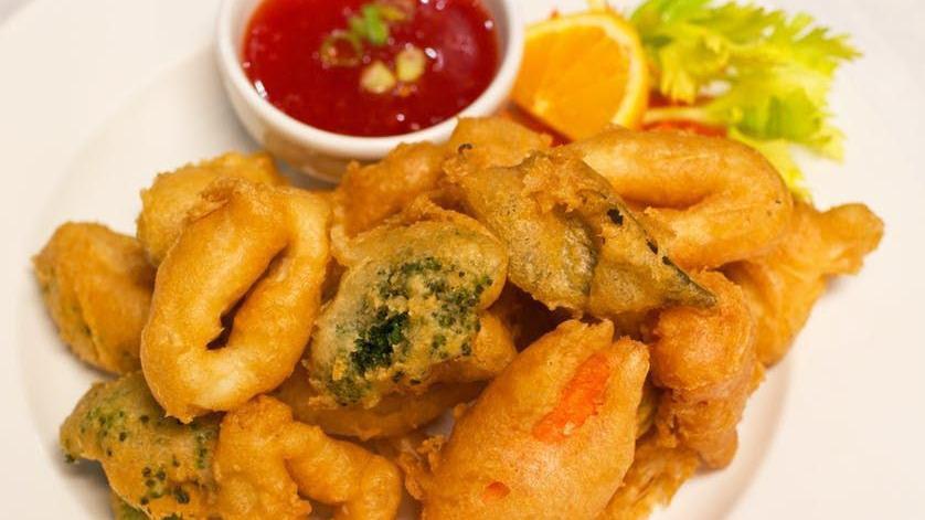 Winter Shrimp · Crispy blanketed of marinated shrimp and served with a sweet dipping sauce.
