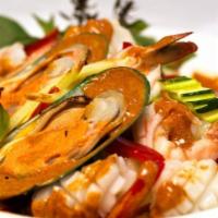 Seafood Tornado · A mixture of shrimp, scallops, calamari, mussels, and fish with sweet chili garlic sauce and...