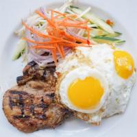 Grilled Pork Chop No 5 & Eggs · Grilled house marinated center cut pork chop, fried eggs, pickled veggies, white rice.