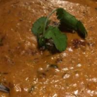 Dal Makhani (Creamy Lentils) · Gluten free. Red and black beans, black chana, urda dal, chana dal, onion, tomato, cream, sp...