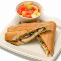 Caprese Sandwich · Mozzarella cheese, red onions, tomatoes, fresh basil, balsamic vinegar and olive oil served ...