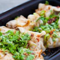 Wontons In Chili Sauce · (10 count). A big favorite here. Rich flavorful pork in a thin & delicate wrapper, steamed &...
