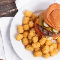 Lake House Burger · Half pound, flame grilled, lettuce, tomatoes, pickle, red onion, sharp Cheddar, on brioche.