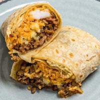 Surf & Turf Burrito · Carne asada with grilled shrimp, Mexican rice, Monterey jack cheese and your choice of white...