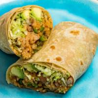 Veggie Avocado Burrito · Fresh sliced avocado, Mexican rice, whole pinto beans, sautéed veggies, lettuce and pico De ...