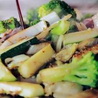 Hibachi Vegetable · Served With  cabbage, carrot and, broccoli 
Choice white rice ,Fried Rice ,  Or Noddle