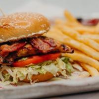 Exp Honey Chicken · Woodfire grilled chicken breast, smoked bacon, shaved lettuce, vine-ripe tomato, mayo, ancho...