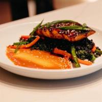 Exp Miso Salmon · Glazed woodfired salmon, forbidden black rice, vegetable sauté, korean hot sauce