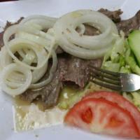 Bistec Encebollado / Onions Steak · 