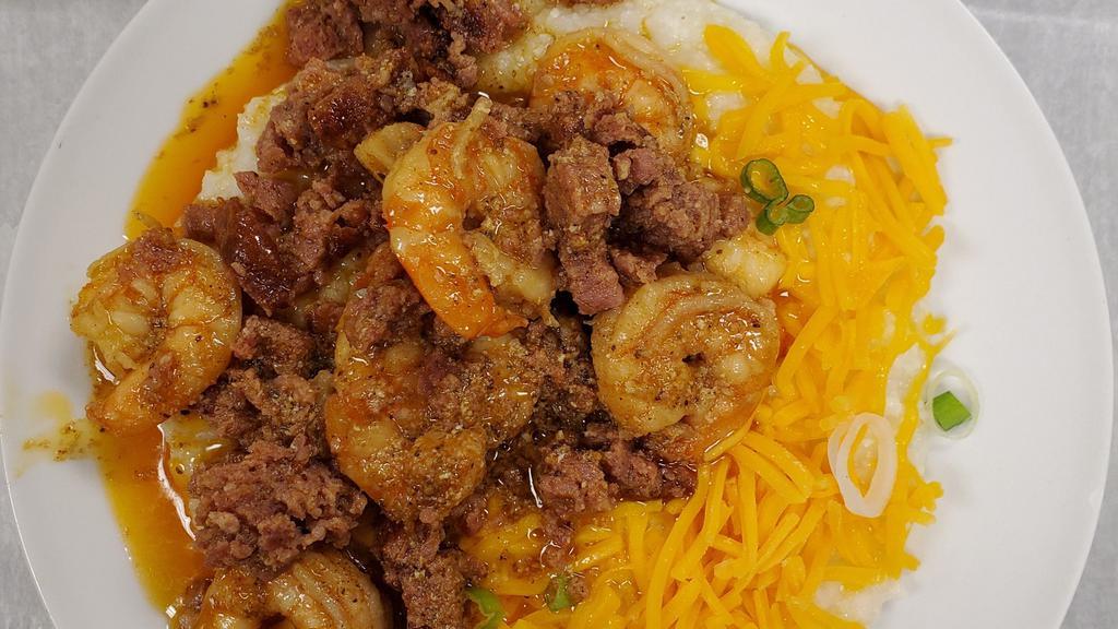Shrimp And Grits · Homestyle Grits with Grilled Shrimp and Diced Andouille topped with Cheddar Cheese