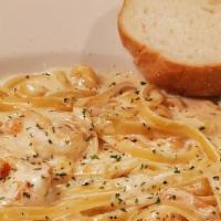 Shrimp Fettuccine · Creamy alfredo sauce cooked with parmesan cheese, , garlic and Grilled  Shrimp, served over ...