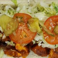Hot Chicken Po-Boy · Grilled or Fried Chicken Tenders with our Hot Sauce