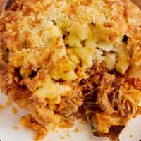 Pulled Pork Mac & Cheese · Slow cooked pork shoulder seasoned with a blend of spices, tossed in our house made BBQ sauc...