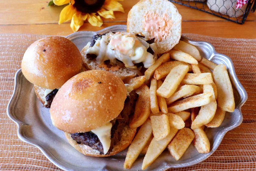 Hamburger Sliders · Meat topped with 1000 Island dressing and White American Cheese.