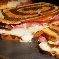 Grilled Reuben Sandwich · Tender pastrami, sauerkraut, swiss cheese, and 1000 island on toasted Jewish rye. Like to ha...