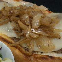 French Dip Sandwich · Roast beef on a toasted hoagie with au jus. Served with natural cut fries.