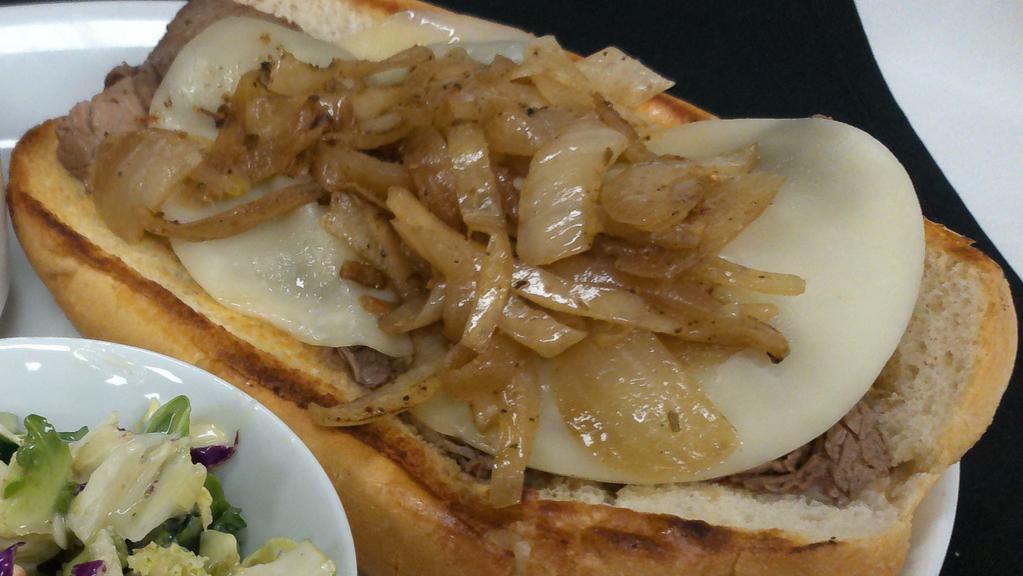 French Dip Sandwich · Roast beef on a toasted hoagie with au jus. Served with natural cut fries.