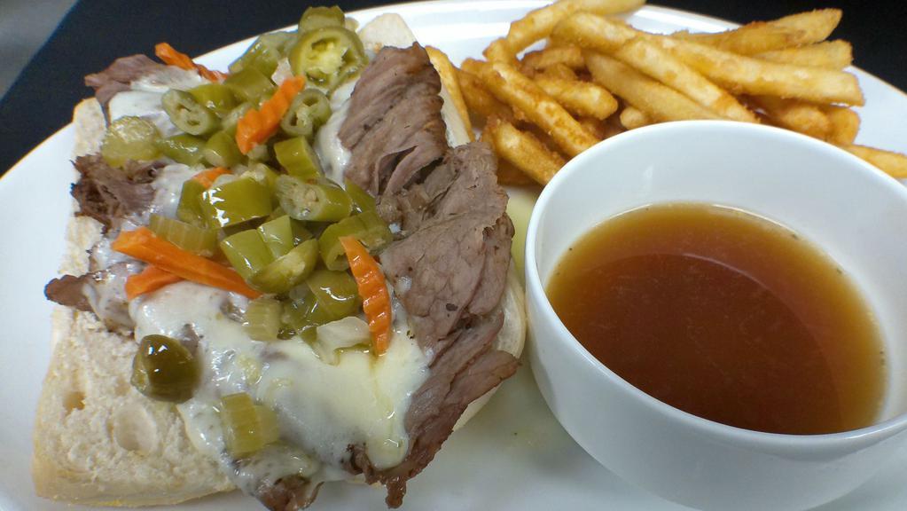 Chicago Style Italian Beef · Thin sliced top sirloin, provolone, choice of mild or hot giardiniera, on a fresh baked french roll. Served w/side of Au Jus.
Add a grilled Italian sausage link for $2