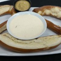 The Big Twist · Fresh from the oven big Bavarian pretzel served with Boulevard Wheat beer cheese and spicy m...
