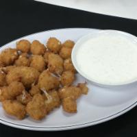 White Cheddar Cheese Curds · Jalapeno white cheddar cheese curds breaded and deep fried. Served with avocado ranch