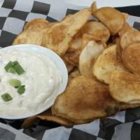 Carmelized Onion Dip · Our take on a traditional French onion dip. Served with Bogey's Pub Chips