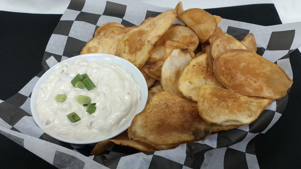 Carmelized Onion Dip · Our take on a traditional French onion dip. Served with Bogey's Pub Chips
