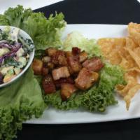 Pork Belly Lettuce Wraps · Smoked pork belly, cubed and seared in our sweet and spicy sweet chili sauce. Green apple an...