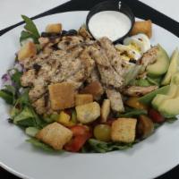 Cobb Salad · Mixed greens, tri-colored peppers, red onion, black olives, jack cheese, hardboiled egg, and...