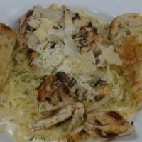 Italia Bowl · Pasta tossed in your choice of house made marinara or creamy parmesan alfredo. Topped with g...