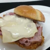 Cordon Bleu · Fried chicken breast, Swiss cheese, ham, Dijon mustard bechamel