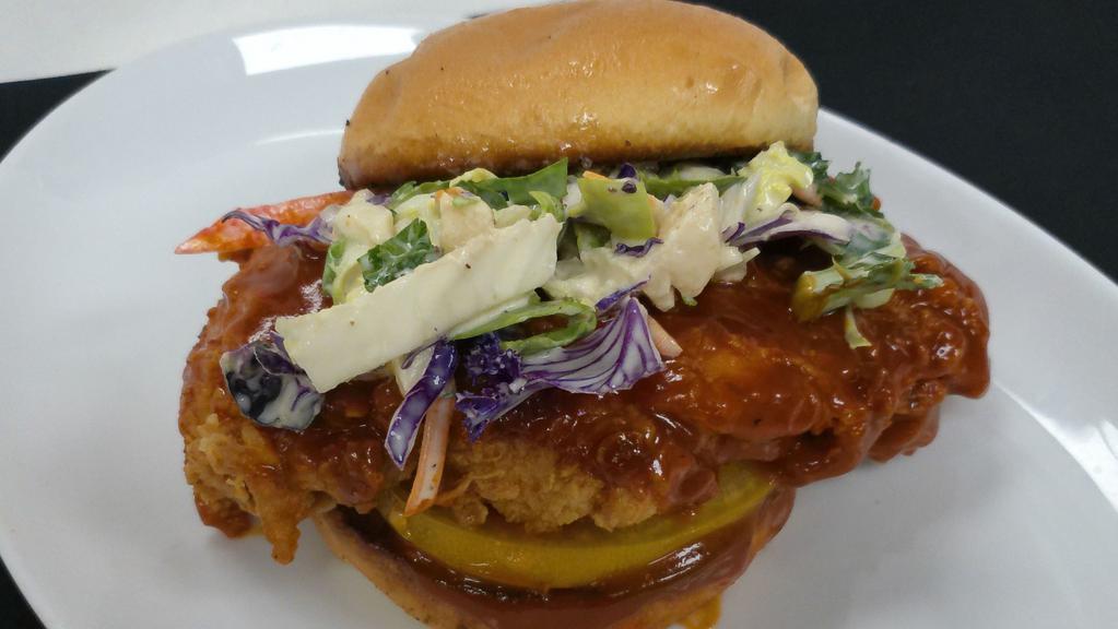 Bogeys Kc Spicey · Fried chicken breast, our signature spicey Jameson glaze, heirloom tomato, green apple slaw