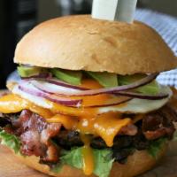 Smash Bacon Avocado Burger Combo · Smash burger with bacon, avocado, cheddar cheese, lettuce, tomatoes, onion, pickles, and may...