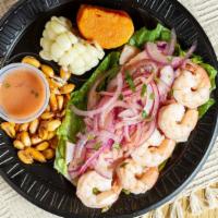 Ceviche Mixto · Fresh fish and seafood in lime juice mixed with special spices, served with sweet potatoes a...
