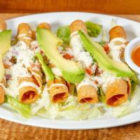 Fried Taquitos · Filled rolled up tortilla that has been fried. cooked in oil.