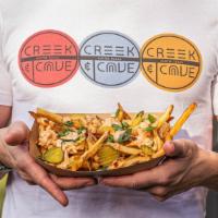 Disco Fries · Hand cut fries topped with pimento cheese, remoulade, pickles and green onion.