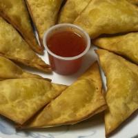 Crabmeat Rangoon (5 Pieces) · Fried wonton filled with crabmeat and cream cheese.