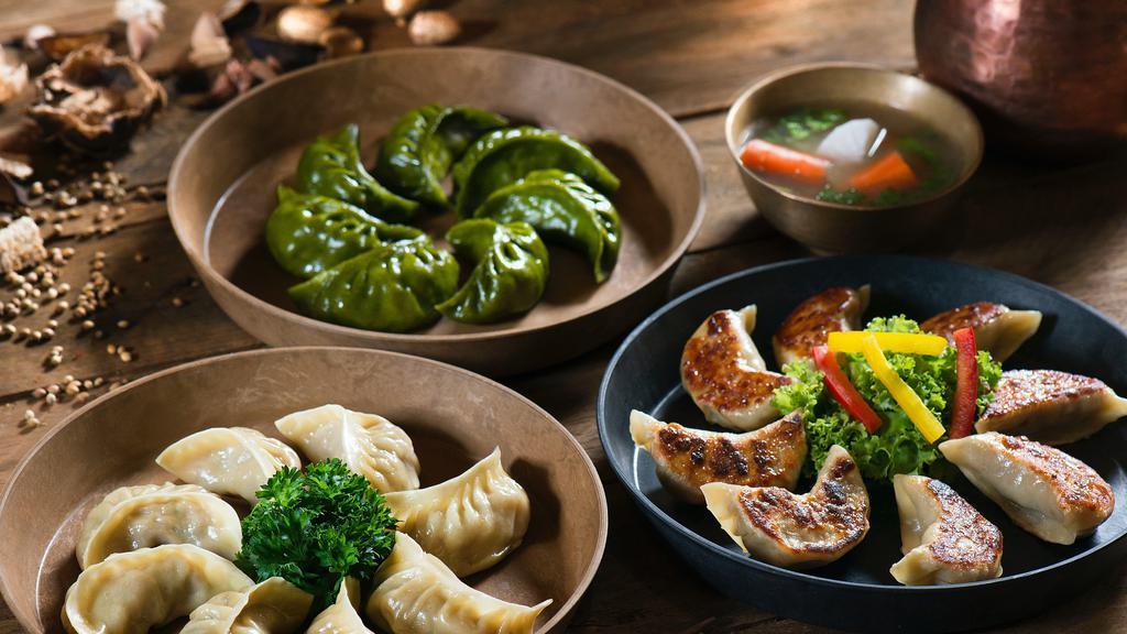 Chicken Dumplings (6 Pieces) · Steamed or pan-fried. Chopped chicken and mixed vegetables. Served with homemade soy sauce on the side.
