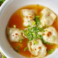 Chicken Wonton Soup · Fried chicken wonton with clear broth.