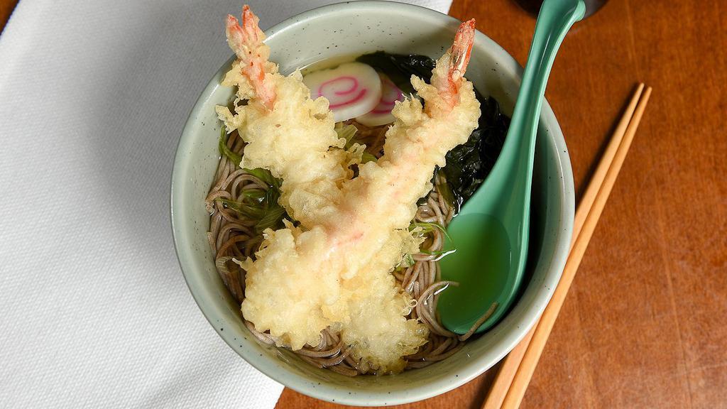 Udon · Thick wheat noodle in clear broth with choice of shrimp tempura, beef, vegetable, nabeyaki.