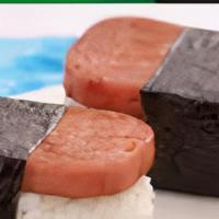 Musubi · Spam musubi is a snack and lunch food composed of a slice of grilled spam sandwiched either ...