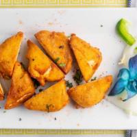 Paneer Pakora · Homemade cheese stuffed with delicious spiced mixture cooked in chickpea batter.